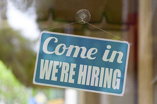 Come in we're hiring sign