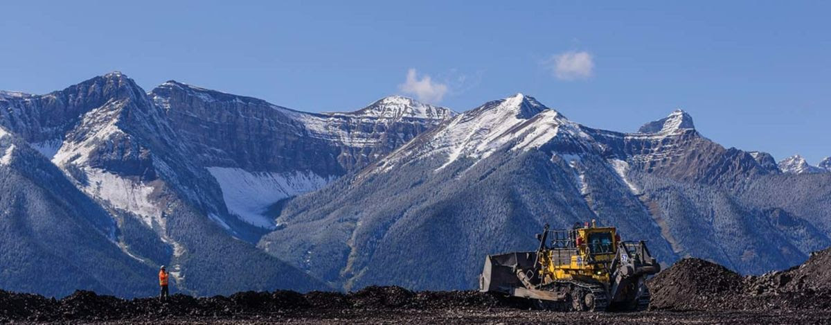 Mining truck against mountain